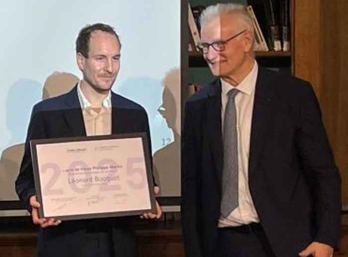 Léonard Bocquet (L) accepting the award